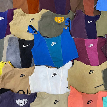 TOP NIKE PLASTRON MIX LOGO UPCYCLÉ (X20)